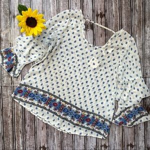 Available white floral blouse NWT size Medium